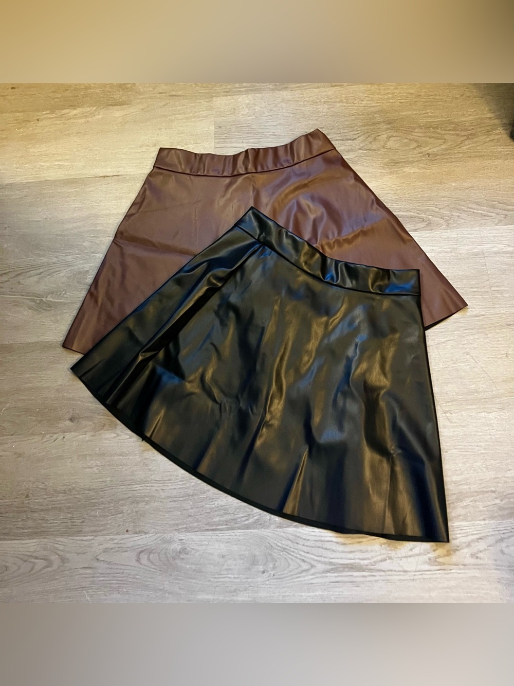 2 size Small A-Line Faux Leather Mini Skirts in black and brown